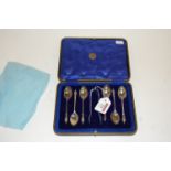 A cased set of six silver apostle spoons, with matching sugar bows,