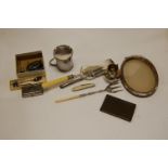 Assorted silver and plated wares to include easel photograph frame, cream jug, crumb scoop,