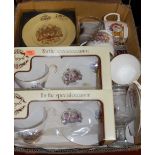 A box of assorted commemorative china,