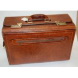 A gentlemans brown stitched leather briefcase with combination lock Condition Report /