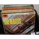 A box of assorted LP records to include; The Beatles Please Please Me, Frank Zappa,