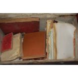A leather clad wooden trunk and contents to include; various scrap books,