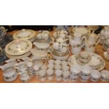 An extensive Royal Doulton eight place setting tea and dinner service in the Larchmont pattern
