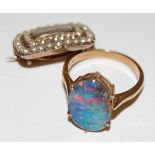 A 9ct gold and opal set dress ring (opal chipped) together with a Victorian seed pearl set mourning