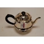 A George V silver bachelors teapot,
