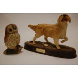 A Royal Doulton figure of a Retriever on a plinth base,