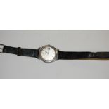 A gents Omega steel cased wrist watch having signed silver dial with baton markers,