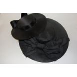 A ladies black dress hat by Peter Bettley together with one other by Hat House Hat, London,