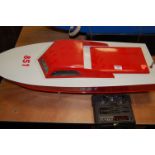 A petrol driven radio controlled model of a speedboat