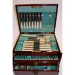 A 1920s mahogany cased canteen of silver plated cutlery,