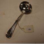 A pair of George III silver sauce ladles in the Old English pattern having monogrammed terminals,
