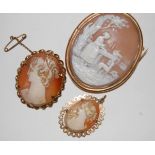 A circa 1900 carved shell cameo brooch depicting a girl and dog within a landscape in a yellow