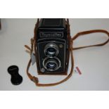 A leather cased Toyocaflex camera