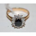 A ladies 9ct gold sapphire and diamond set flower head cluster ring,