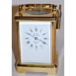 A l'Epee of France lacquered brass case carriage clock having visible platform escapement,