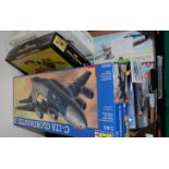 A collection of assorted built and part-built plastic kit models of aircraft,
