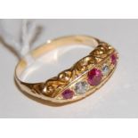 A ladies 18ct gold ruby and diamond set ring,