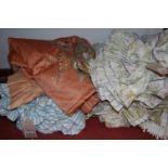 A collection of assorted floral and other curtains