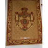 A 19th century needlepoint wall hanging depicting a crowned and flagged fleur de lys