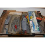 A box of assorted part and built plastic kits to include naval ships etc