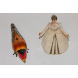 An early 20th century clockwork tinplate model of a ballerina;