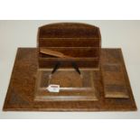 A Victorian style leather clad desk set to include stationery rack,