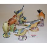 A collection of six Royal Worcester bird figures to include; 2x Blue Tit, Wood Warbler, Nightingale,