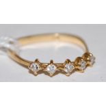 An 18ct gold diamond five stone ring