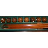 A boxed The Imp Brand Royal Game of Billiard Bowls,