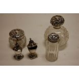 An Edwardian hobnail cut glass and silver mounted scent bottle and stopper;