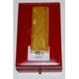 A Cartier textured gold plated cased pocket cigarette lighter, No.