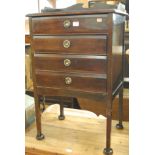 An Edwardian walnut three-quarter gallery backed four drawer music chest,