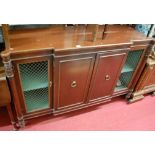 A reproduction mahogany breakfront four door side cupboard, in the Regency taste, w.