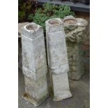 A pair of carved stone garden pedestals,