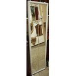 A pair of white painted rectangular marginal wall mirrors,