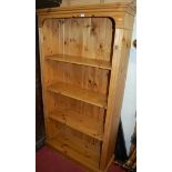 A modern pine freestanding open bookshelf, w.