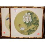 Pair of oriental watercolours on silk depicting a butterfly amidst blossoming flowers, dia.