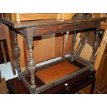 An antique joined oak side table, w.