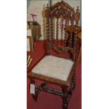 A 19th century oak single dining chair, in the Caroleon manner,