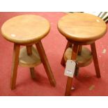 A pair of contemporary stained pine sculptors tables,