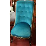 A Victorian mahogany framed and blue buttonback upholstered nursing chair