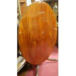 A 19th century mahogany oval tilt-top pedestal supper table,