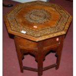 A Moorish teak and brass inset octagonal occasional table Condition Report / Extra