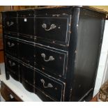 A Continental ebonised oak three drawer chest,