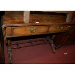A Regency style walnut and crossbanded dropflap two drawer sofa table,