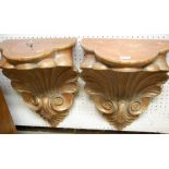 A pair of reproduction gilt wood wall brackets, height 44cm, width 31cm,