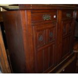 An Edwardian walnut two door side cupboard,