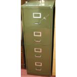 A mid 20th century green painted metal four drawer office filing cabinet by Howden