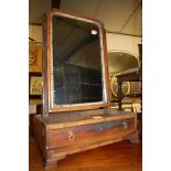 A George III walnut dressing table mirror, raised on single drawer boxbase, w.