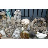 A collection of reconstituted stoneware garden ornaments being various animals,